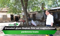 Çizmeleri giyen Başkan Örki sel mağdurlarının yardımına koştu